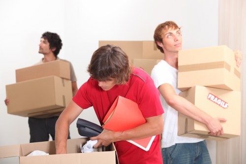 Packed boxes and furniture prepared for Elmpark relocation